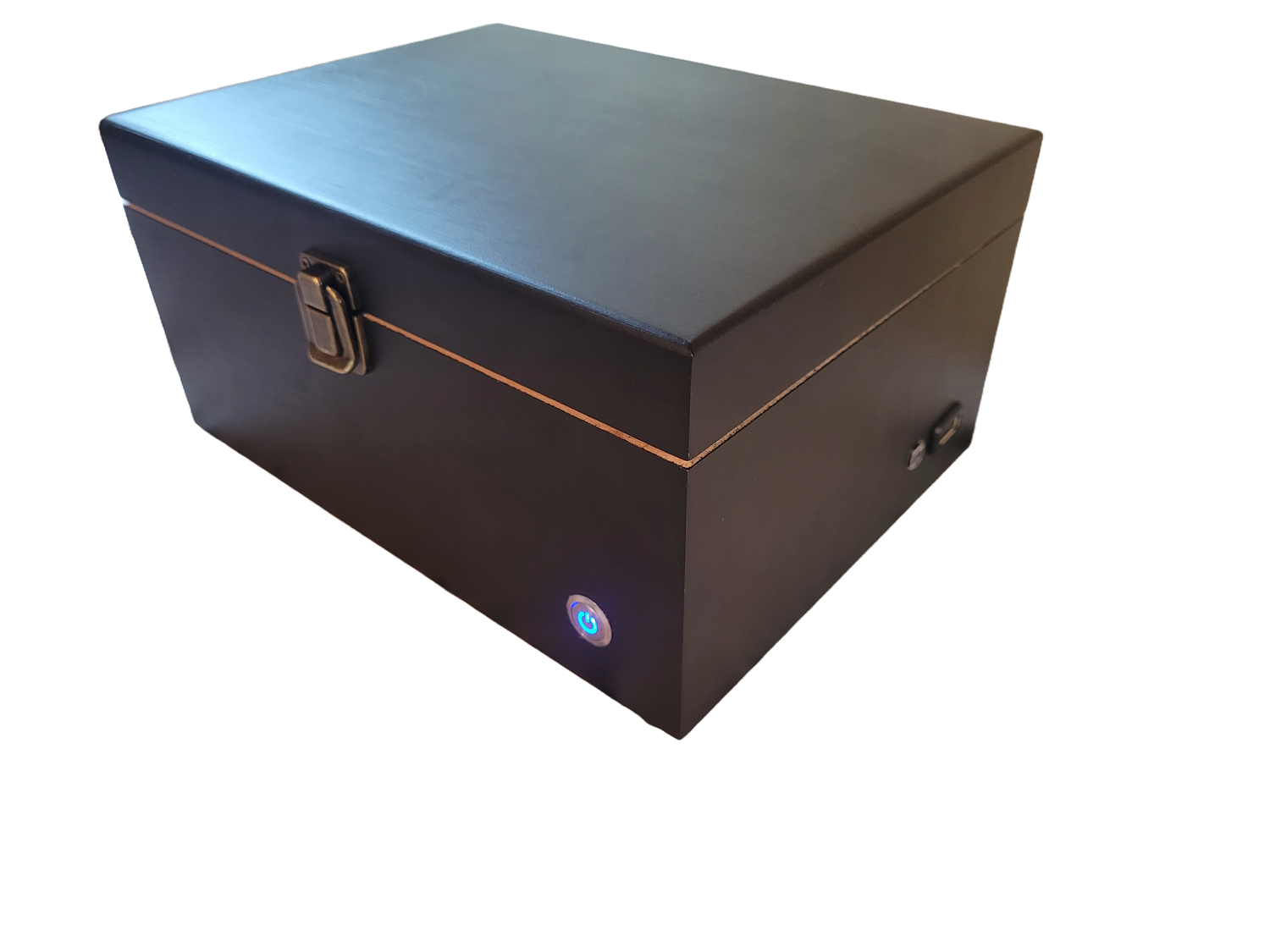 A closed soundproof enclosure box made of black wood with a white noise generator built-in, featuring a USB connection and an LED status indicator.
