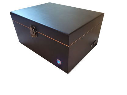 A closed soundproof enclosure box made of black wood with a white noise generator built-in, featuring a USB connection and an LED status indicator.